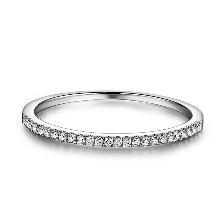 Elegant thin silver band ring with sparkling pavé gemstones, perfect for a unique, stylish look.
