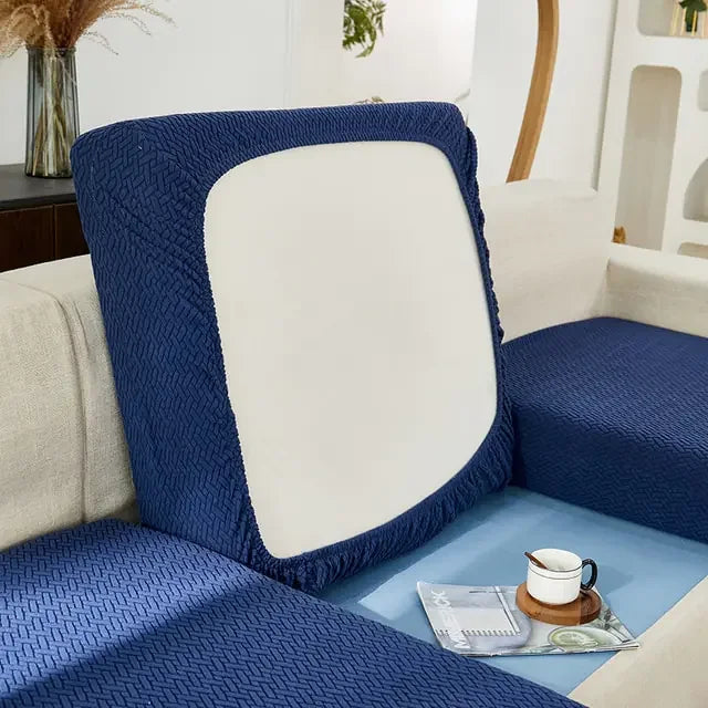 Modern living room with unique blue textured sofa cover and stylish decor accent.