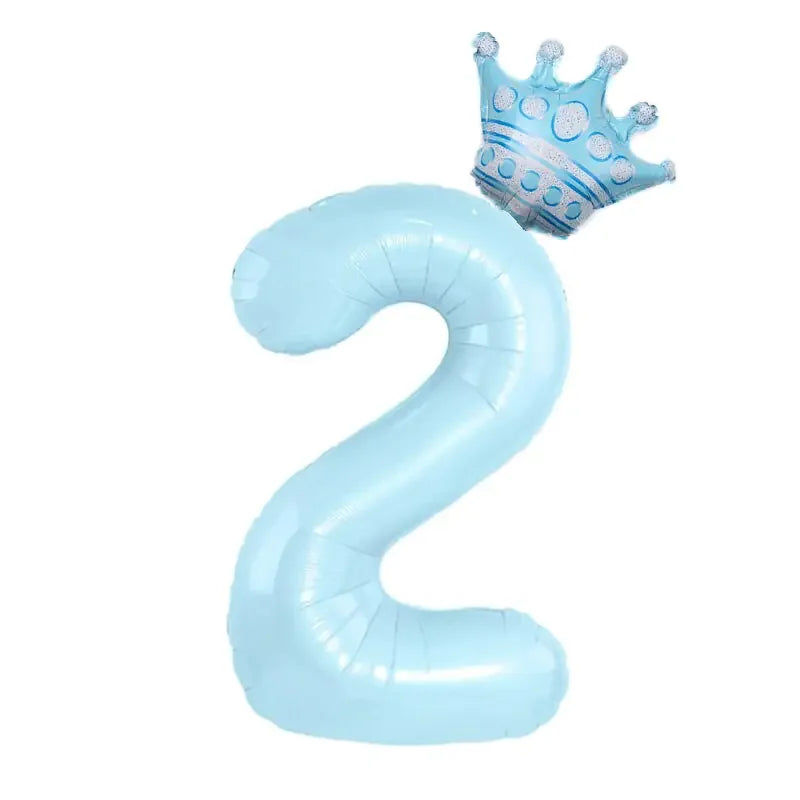 Light blue number 2 balloon with a playful crown, perfect for unique birthday party decor.