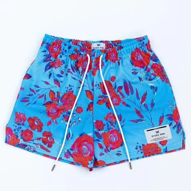 Vibrant blue floral shorts with bold red and purple flowers, unique design for summer style