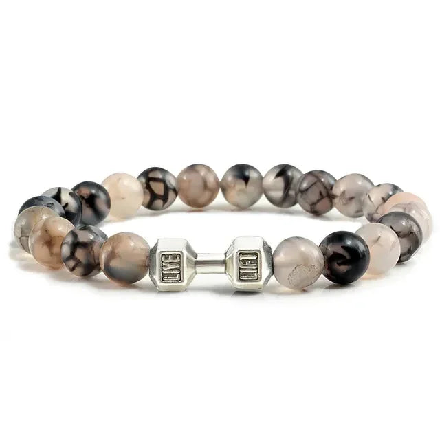 Curious gemstone beaded bracelet with unique silver dumbbell charm, stylish and eye-catching.