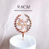 Elegant rose gold Happy Birthday cake topper with laurel wreath design, measuring 9.8cm.