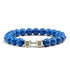 Striking blue gemstone bead bracelet with unique silver dumbbell accent, perfect for bold style