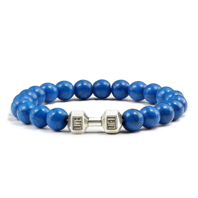 Striking blue gemstone bead bracelet with unique silver dumbbell accent, perfect for bold style
