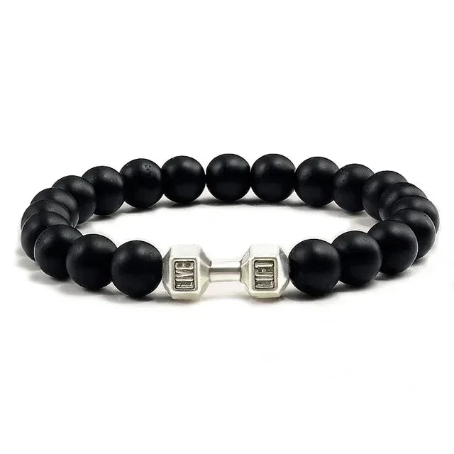 Bold matte black beaded bracelet with silver dumbbell charm, perfect for unique style seekers.