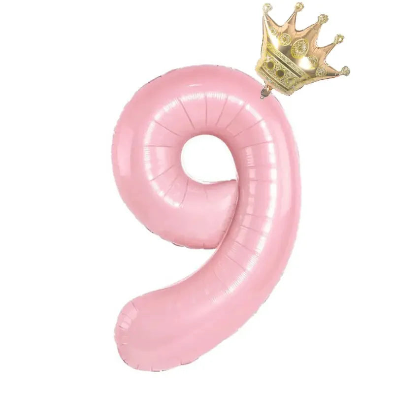 Charming pink number nine balloon with a gold crown, perfect for unique party décor.