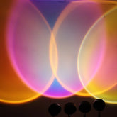 Captivating overlapping rainbow lights create a unique, artistic wall décor effect