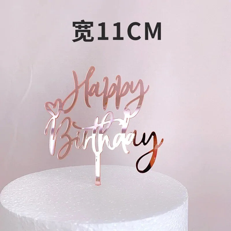 Chic rose gold Happy Birthday cake topper with heart accents, perfect for stylish celebrations.