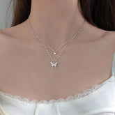 Delicate layered butterfly necklace with shimmering crystals, perfect for unique, stylish looks