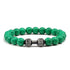 Striking green beaded bracelet with unique silver dumbbell charm, perfect for fitness lovers.