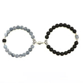 Unique matching set of black matte and crackle stone bead bracelets with intricate silver accents