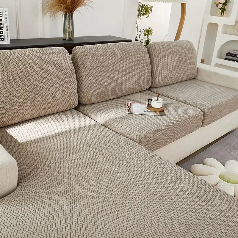 Textured beige sectional sofa in modern living room, inviting cozy relaxation and style