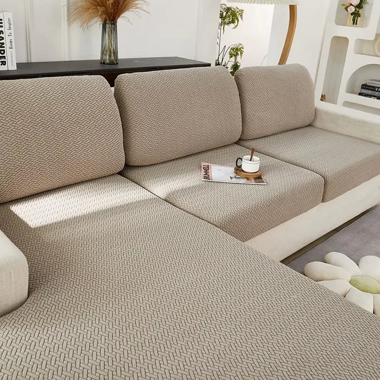 Textured beige sectional sofa in modern living room, inviting cozy relaxation and style