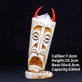 Curious tribal face ceramic mug with red horns, unique home decor drinkware accent
